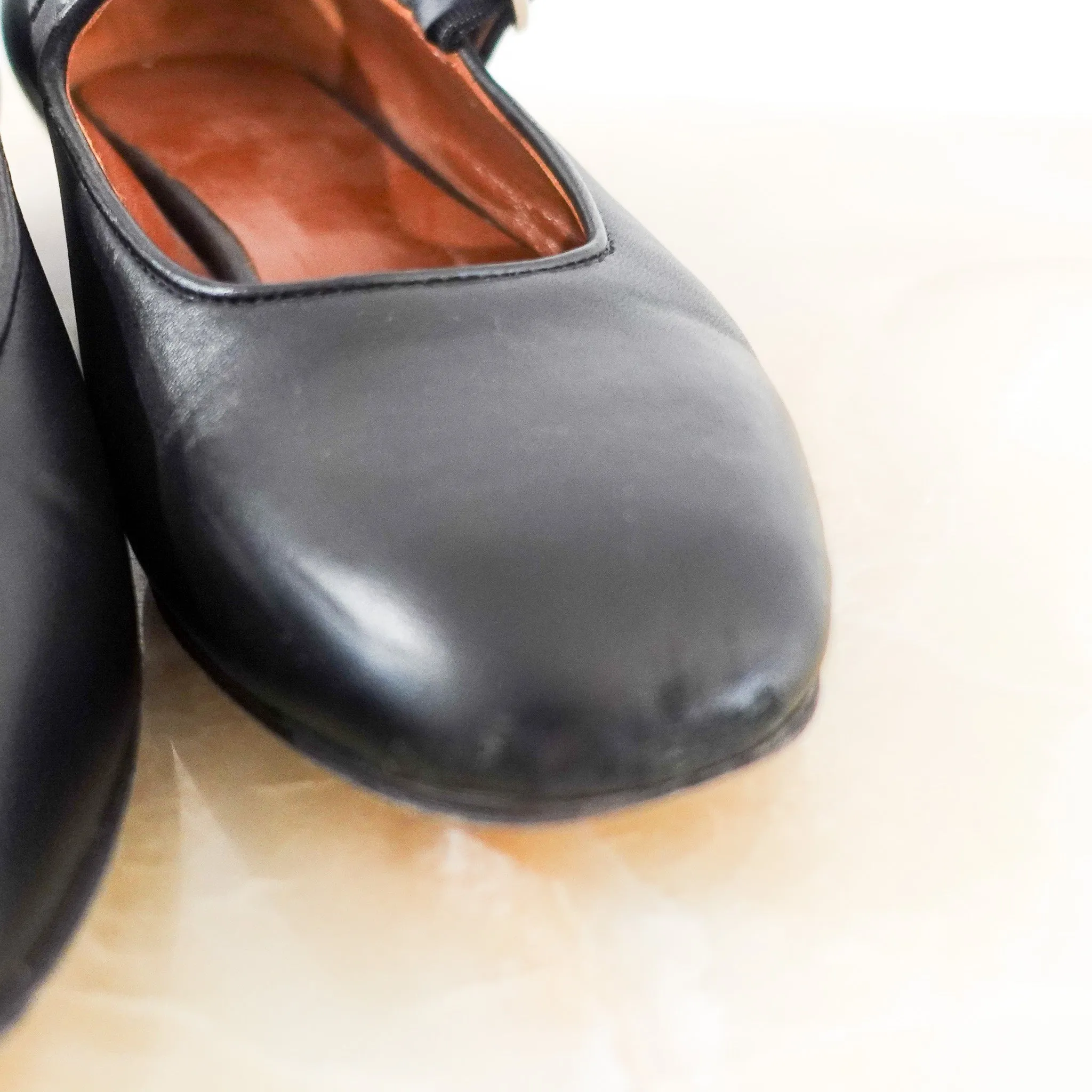 Black flat mary janes RRP £395